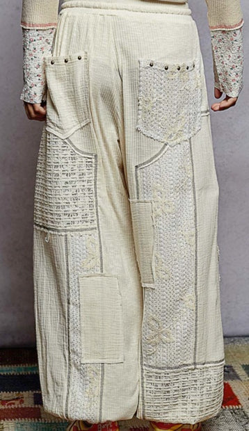 Cream patch pants back