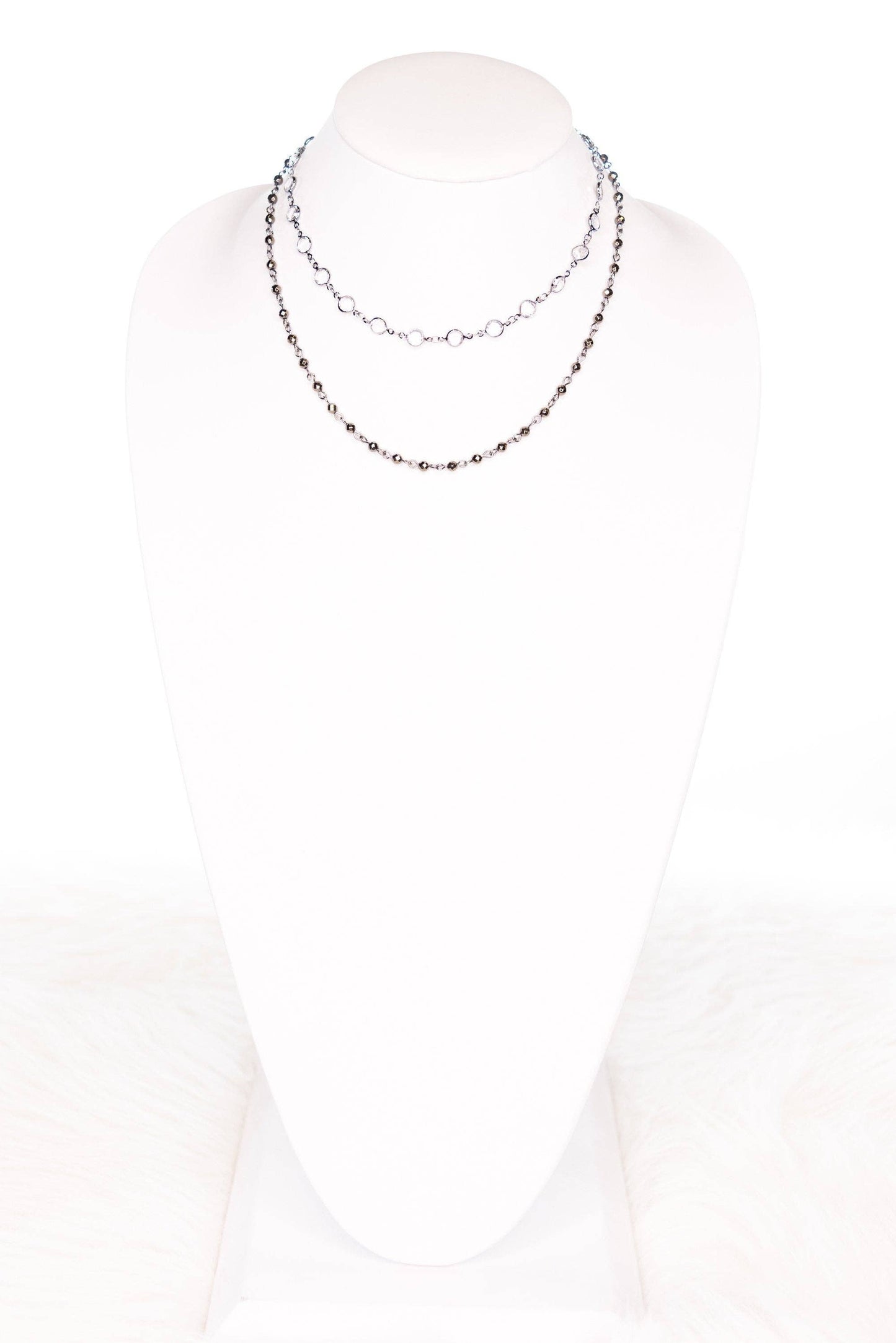 Necklace on a mannequin with a white background