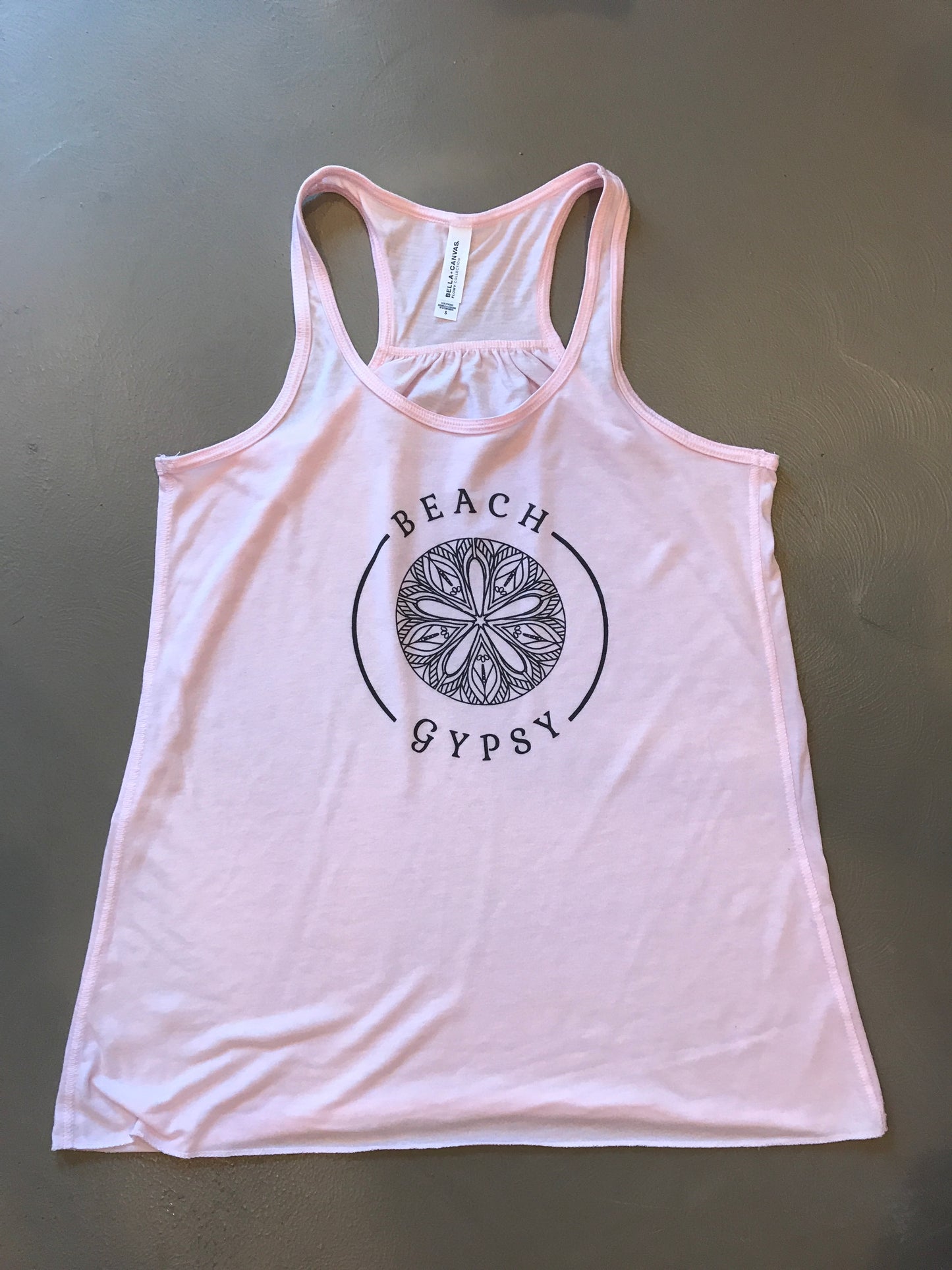 pink tank top with black Beach Gypsy logo