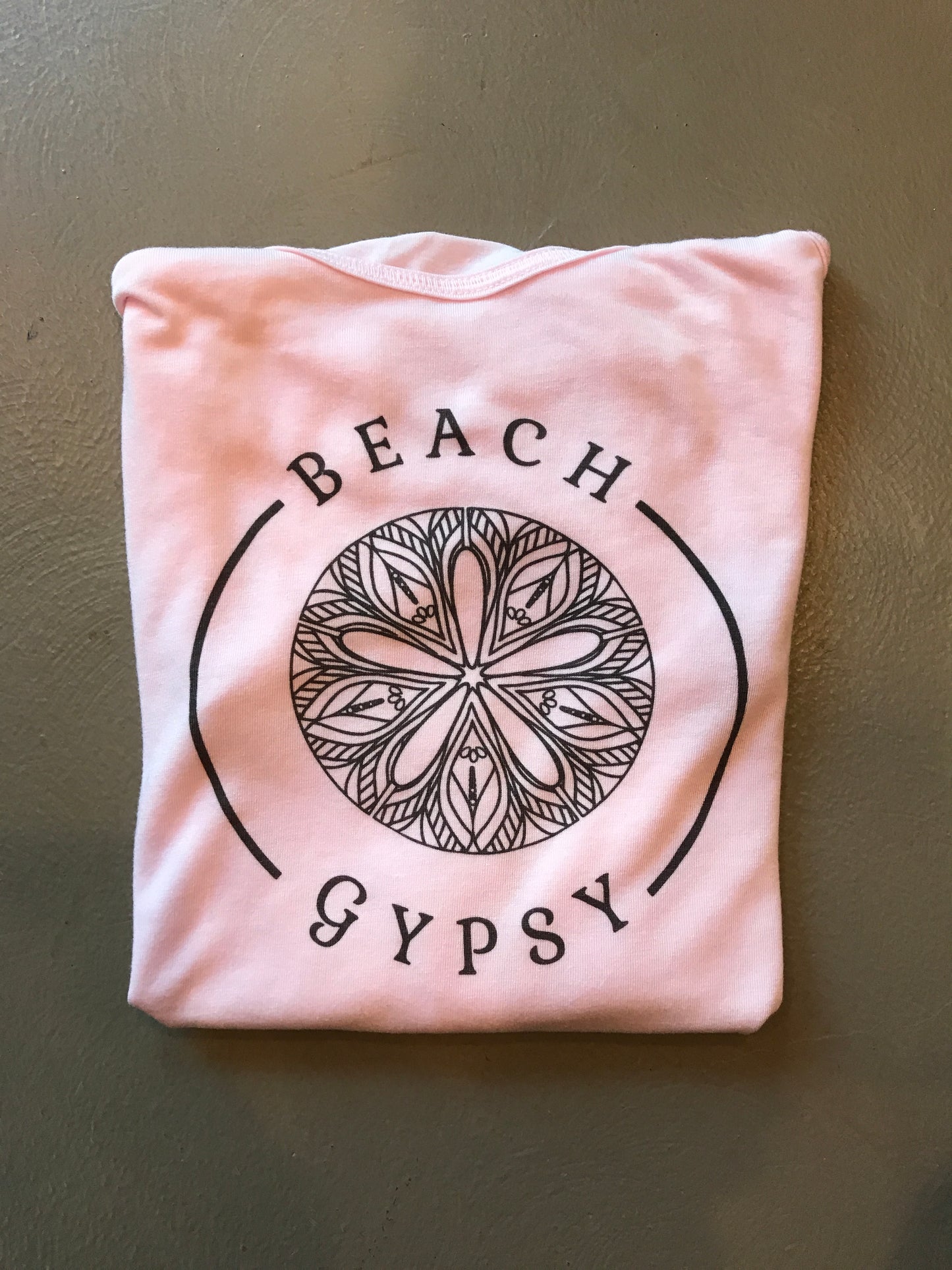 pink tank top with black Beach Gypsy logo