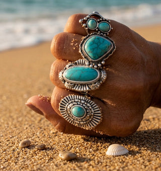 4 natural stoned rings in silver-toned metal 