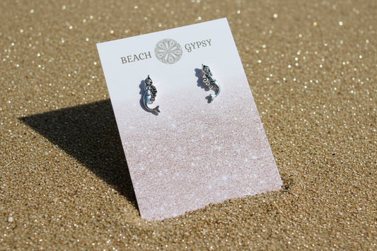mermaid earrings in sand