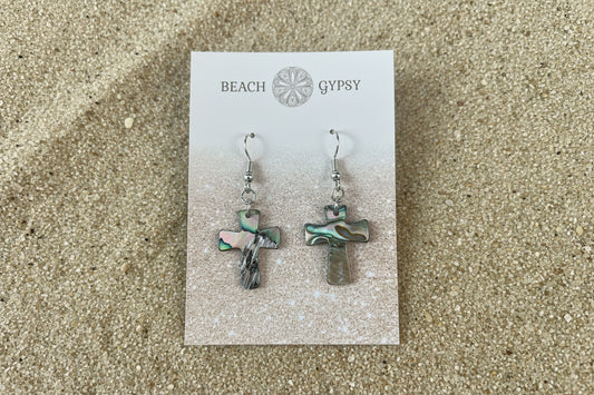 Abalone cross earrings on Beach Gypsy card on sand 