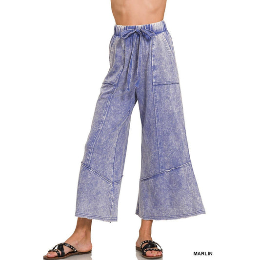 Drawstring waist and exposed seam flared pants