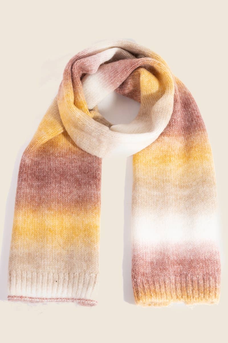 Gradient scarf with yellow, pink, and white colors on a beige background