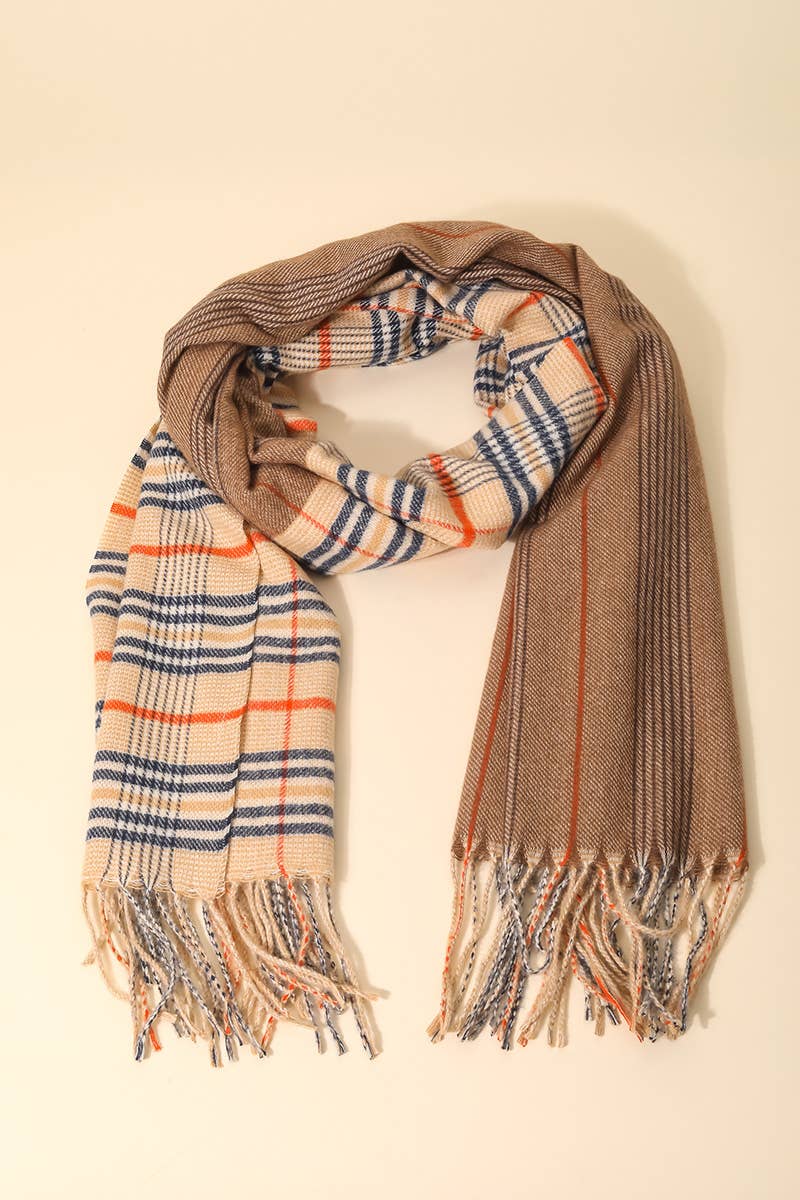 Plaid scarf with brown, beige, and blue pattern on a light background