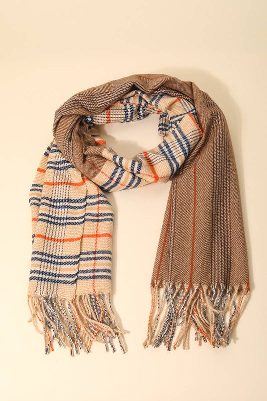 Plaid scarf with brown, beige, and blue pattern on a light background