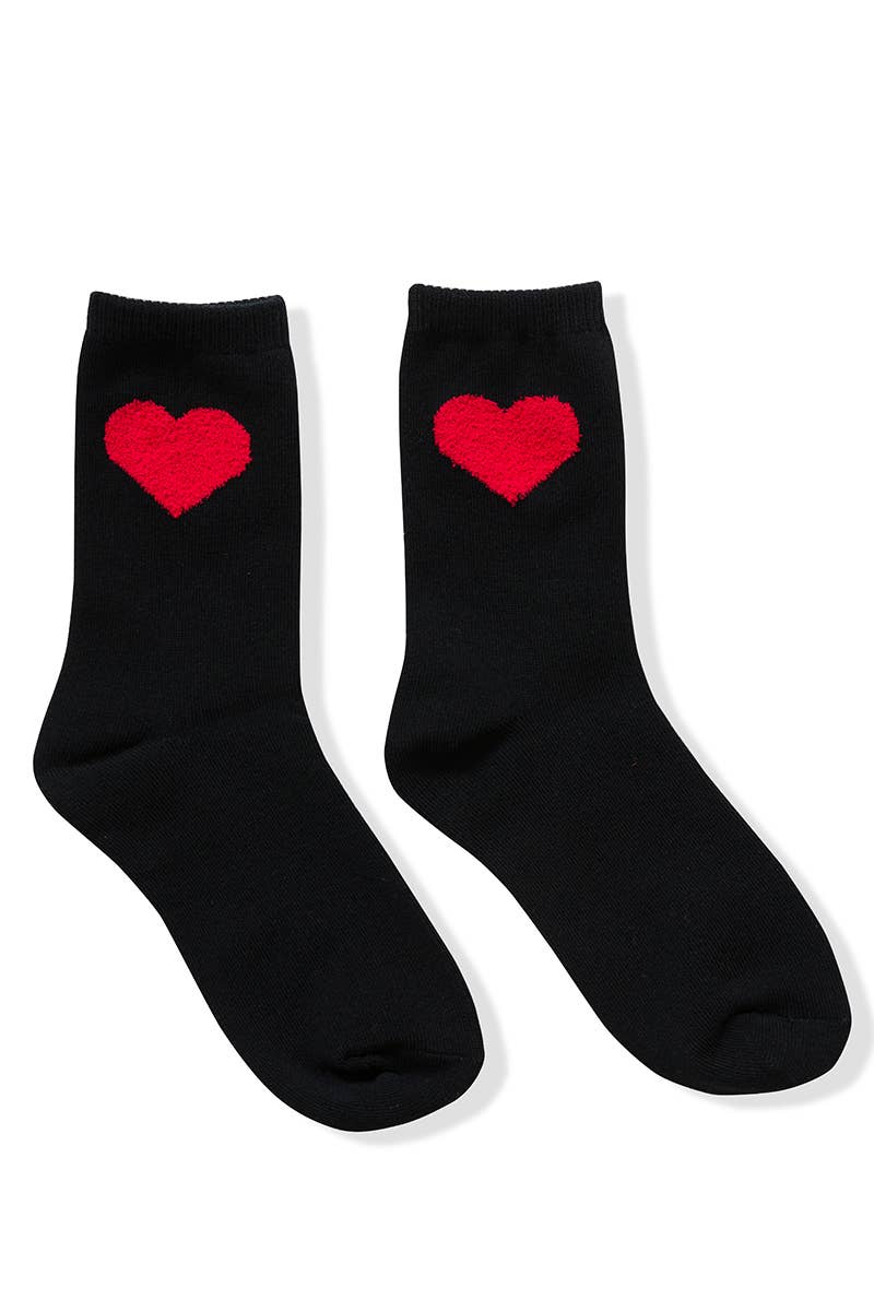 Black socks with red hearts on a white background
