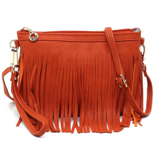 Orange fringed handbag with gold accents on a white background