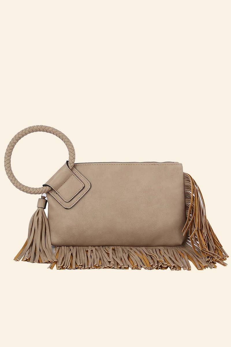 Beige handbag with fringe details on a beige background