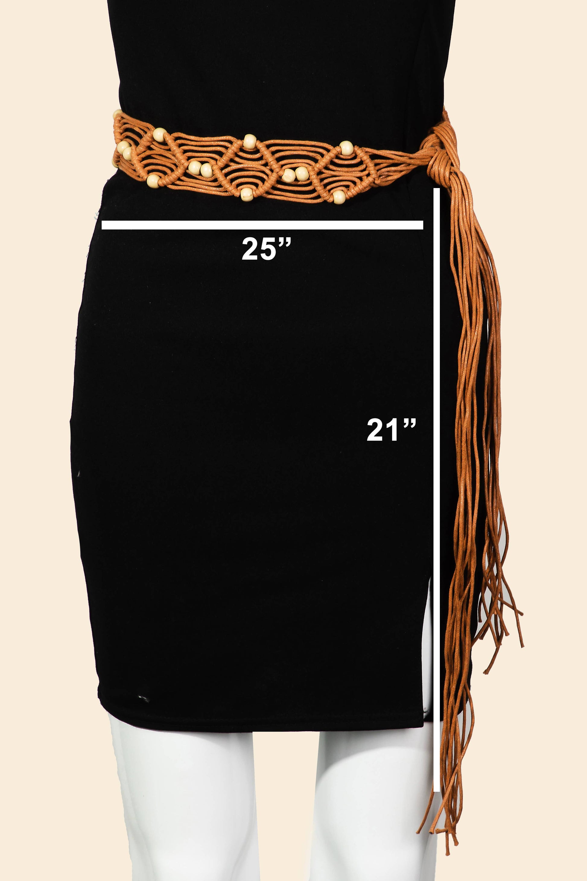 Black skirt with brown fringe and belt, showing measurements on a beige background