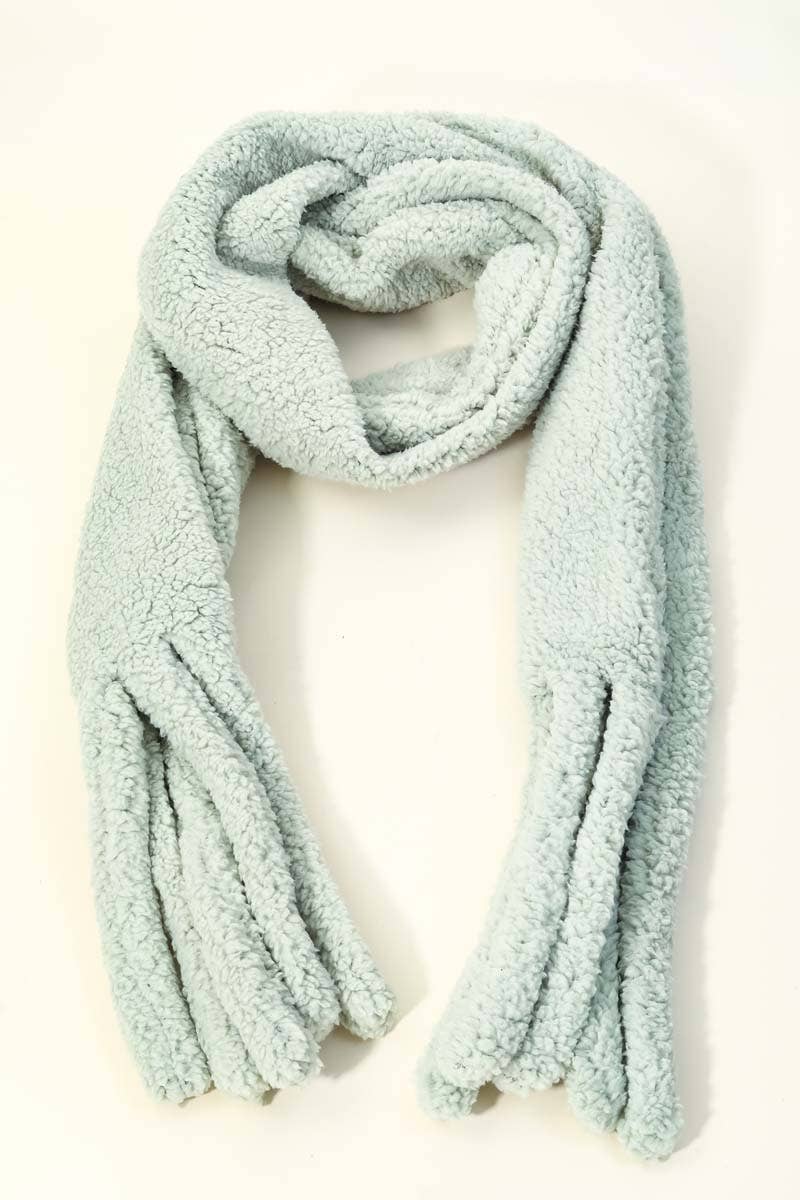 Light blue fleece blanket on a white background