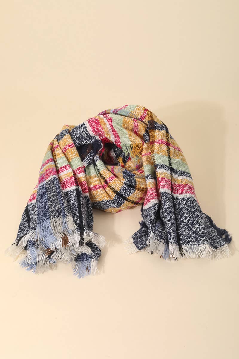 Multicolored striped scarf with tassels on a beige background