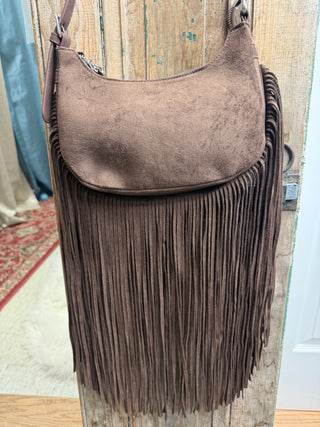 Front close-up of brown suede-style shoulder bag with flap and long boho fringe – Beach Gypsy