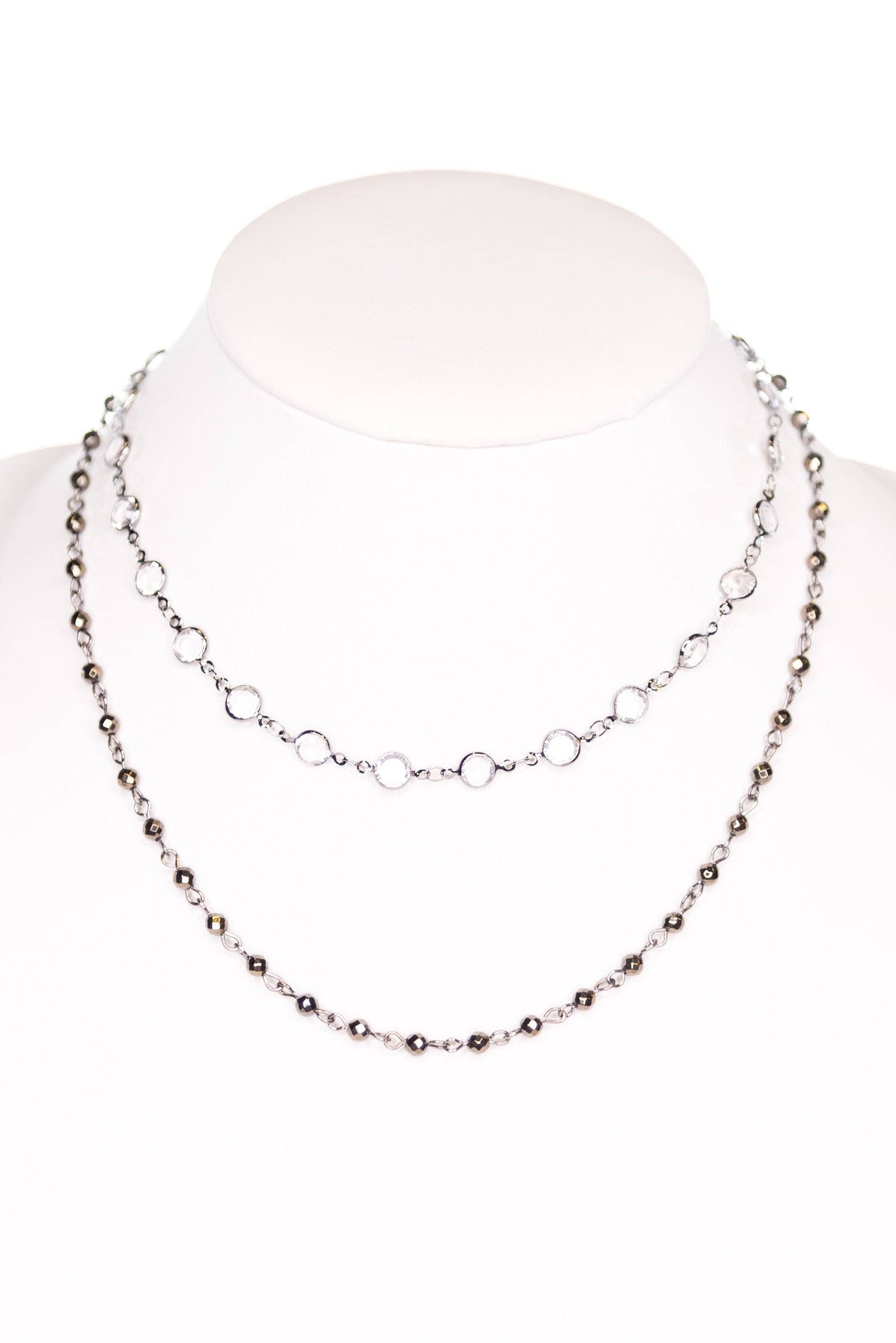 Necklace on a mannequin with a white background