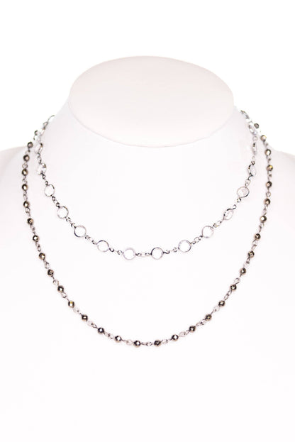 Necklace on a mannequin with a white background