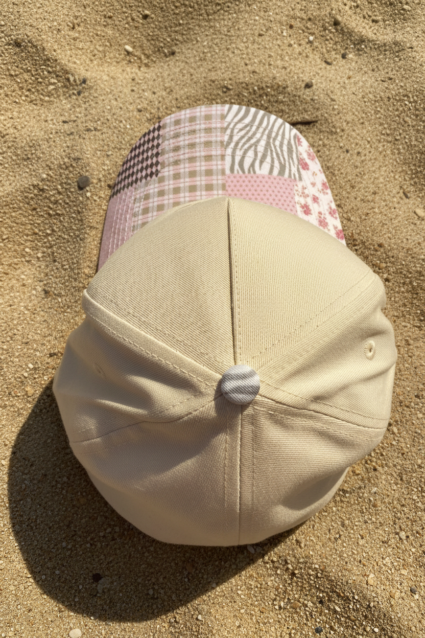 Top of a Beige hat with patchwork brim. 