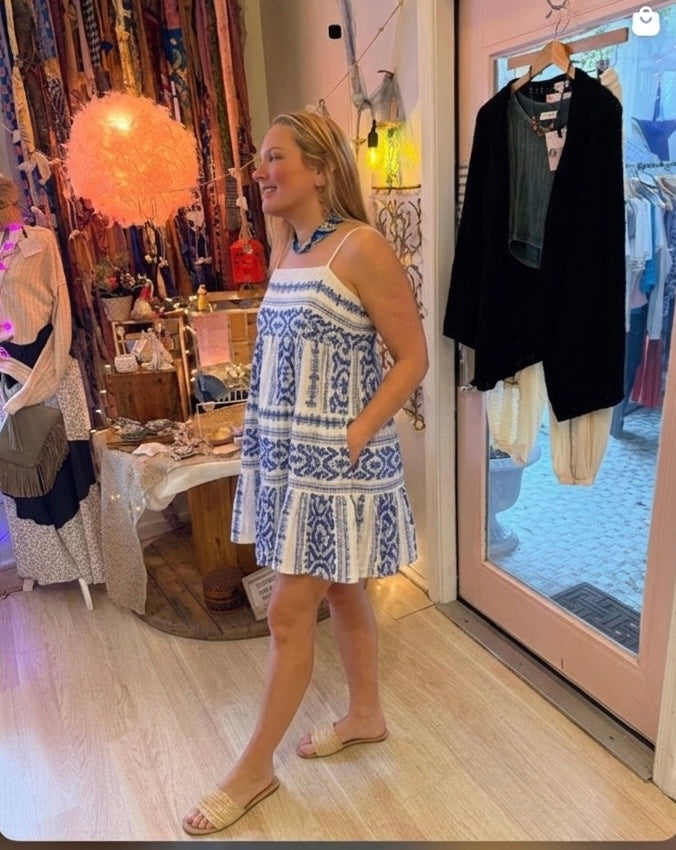 Beach Gypsy wearing Coastal Tile blue and white spaghetti strap dress in her Berlin, MD location