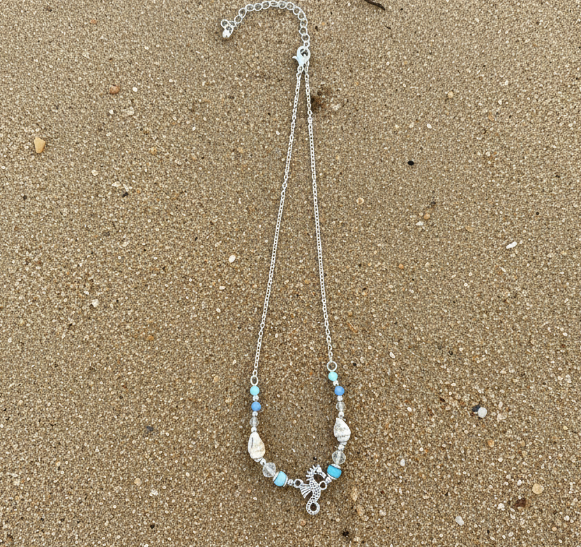 Seahorse necklace on a sandy beach in Berlin, MD near Ocean City