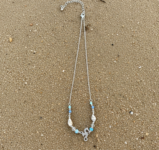 Seahorse necklace on a sandy beach in Berlin, MD near Ocean City
