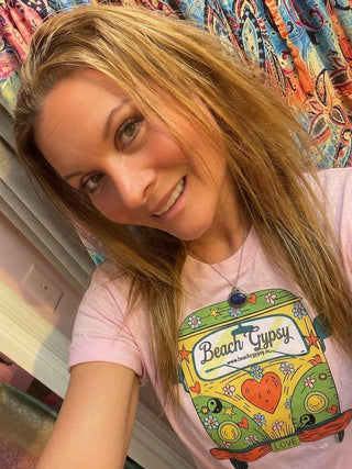 Beach Gypsy wearing a 'Beach Gypsy' t-shirt with a colorful design.