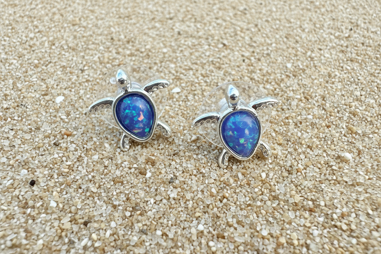 Turtle glitter earrings on sandy beach in Berlin, MD near Ocean City Maryland 