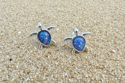 Turtle glitter earrings on sandy beach in Berlin, MD near Ocean City Maryland 