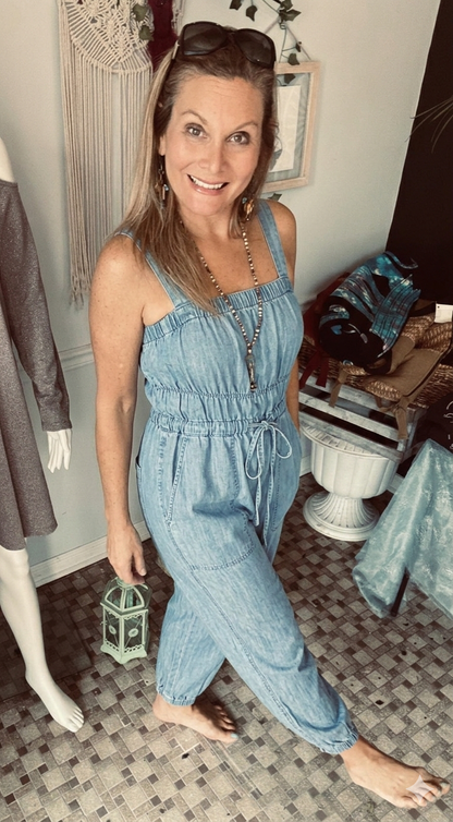 Light denim jumpsuit for spring and summer. Available in Berlin, MD just minutes from Ocean City.