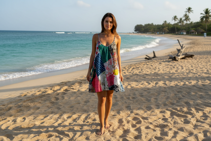 Girl on beach  with a patchwork shirt dress