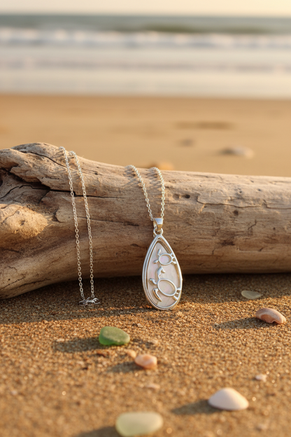 mother of peqarl pendant with 2 turtles swimming