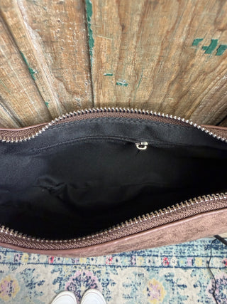 Open brown fringe shoulder bag showing black lined interior and zipper – Beach Gypsy
