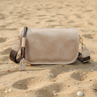 Geometric Pattern Strap Zipper Shoulder Bag, Beige colored on sand background