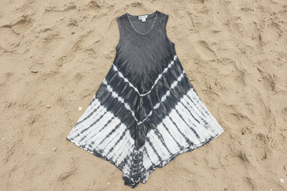 Tie-dye dress on a sandy surface