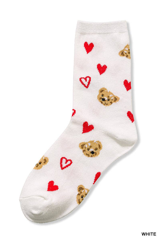 White sock with teddy bear and heart patterns on a white background