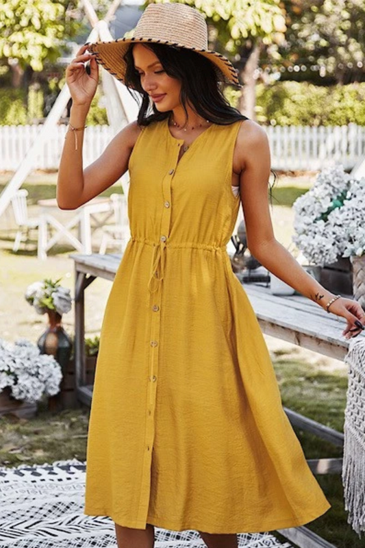 Woman in Yellow button down dress