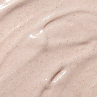 Close-up of a smooth, beige-colored cream or paste