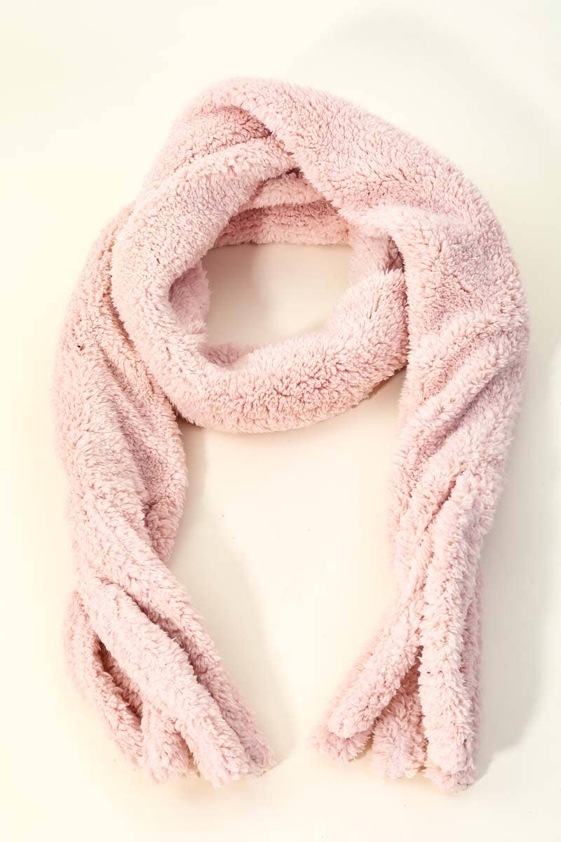 Pink fluffy scarf on a white background