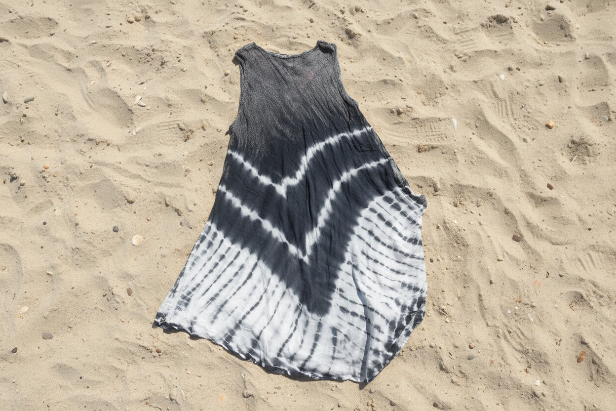 Back side of Tie-dye patterned fabric on a textured surface