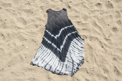 Back side of Tie-dye patterned fabric on a textured surface