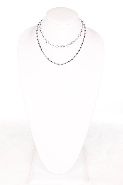 Necklace on a mannequin with a white background