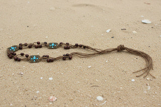 Boho Braided Rope Belt laid flat to show its buckle and woven texture