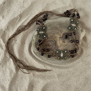 Boho Braided Rope Belt laid flat to show its buckle and woven texture