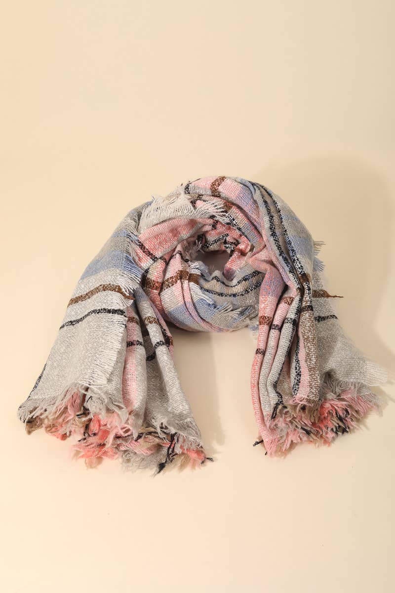Plaid scarf with pink and blue patterns on a beige background