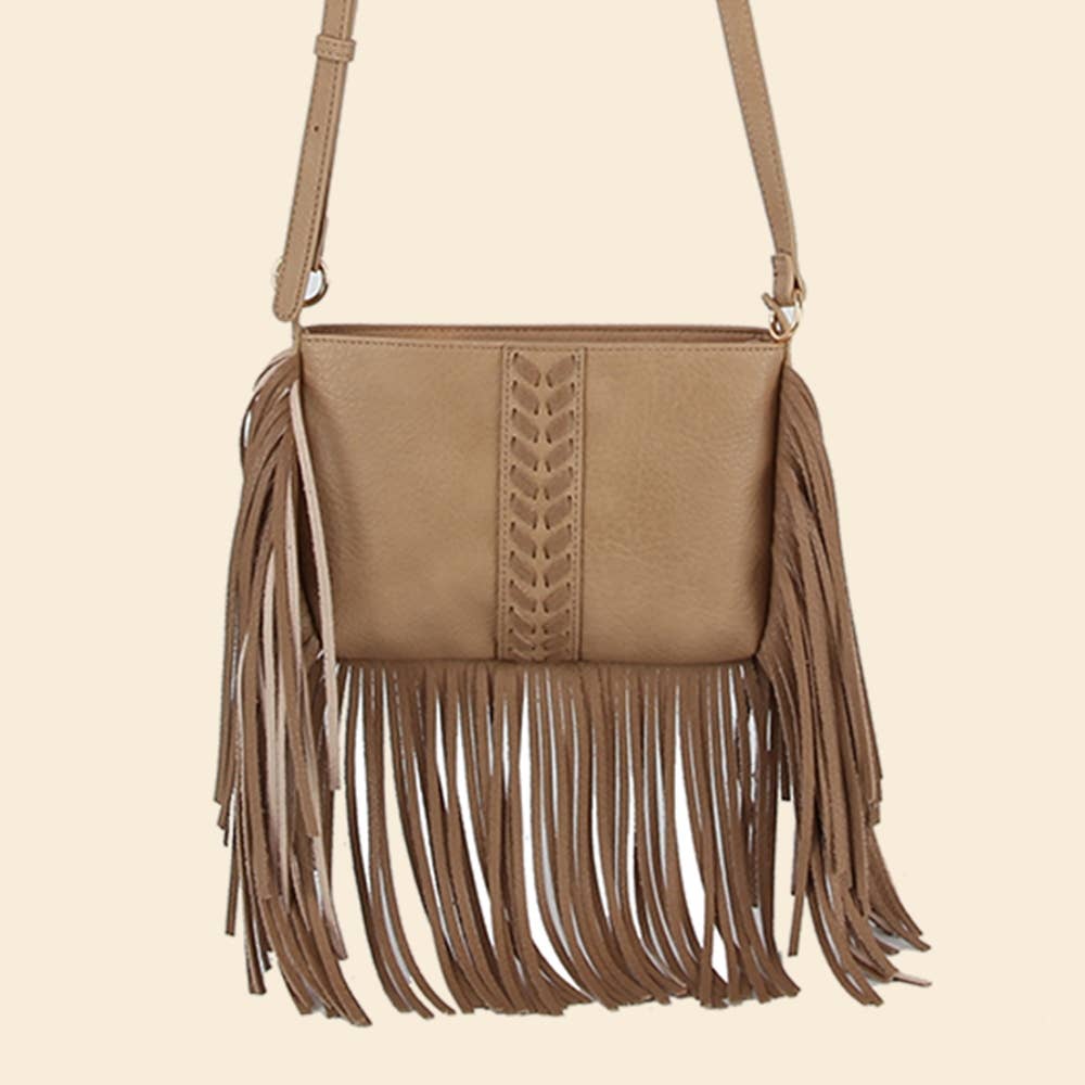 Beige handbag with fringe details on a beige background