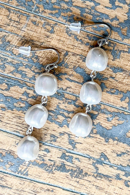 Triple Pearl Drop Earring on painted wood 