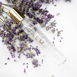 Crystal Roller Natural Perfume bottle displayed upright, showing its label and cap design