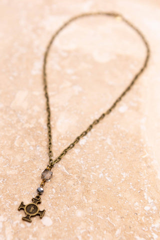 Dulca Necklace laid flat, highlighting its pendant design