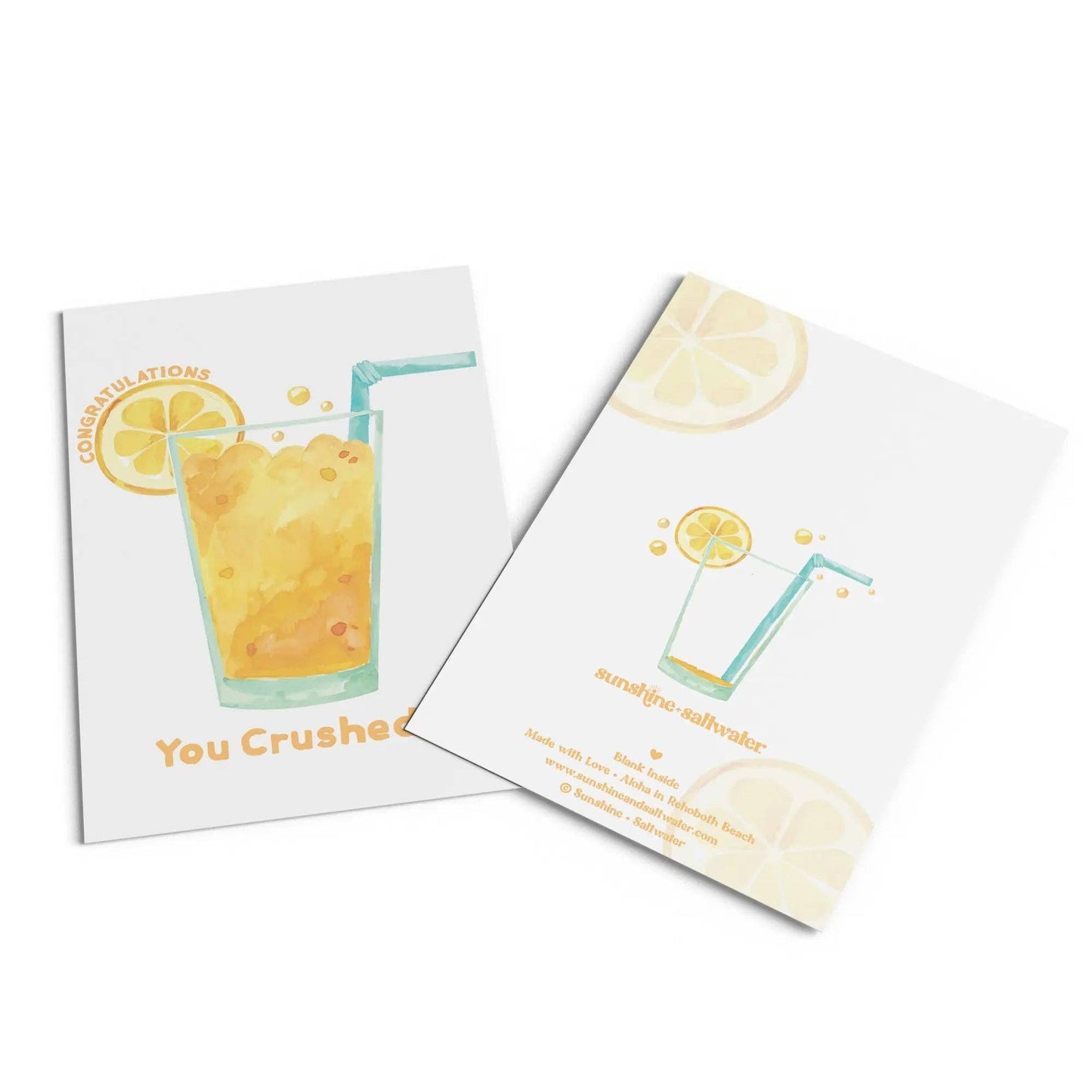Congratulations card with an orange drink on it on white background