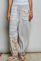 Elastic Cuff Patch Pants shown flat, highlighting the relaxed fit