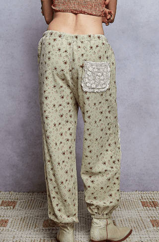 Floral Print Patch Jogger Pants shown flat, highlighting the relaxed fit